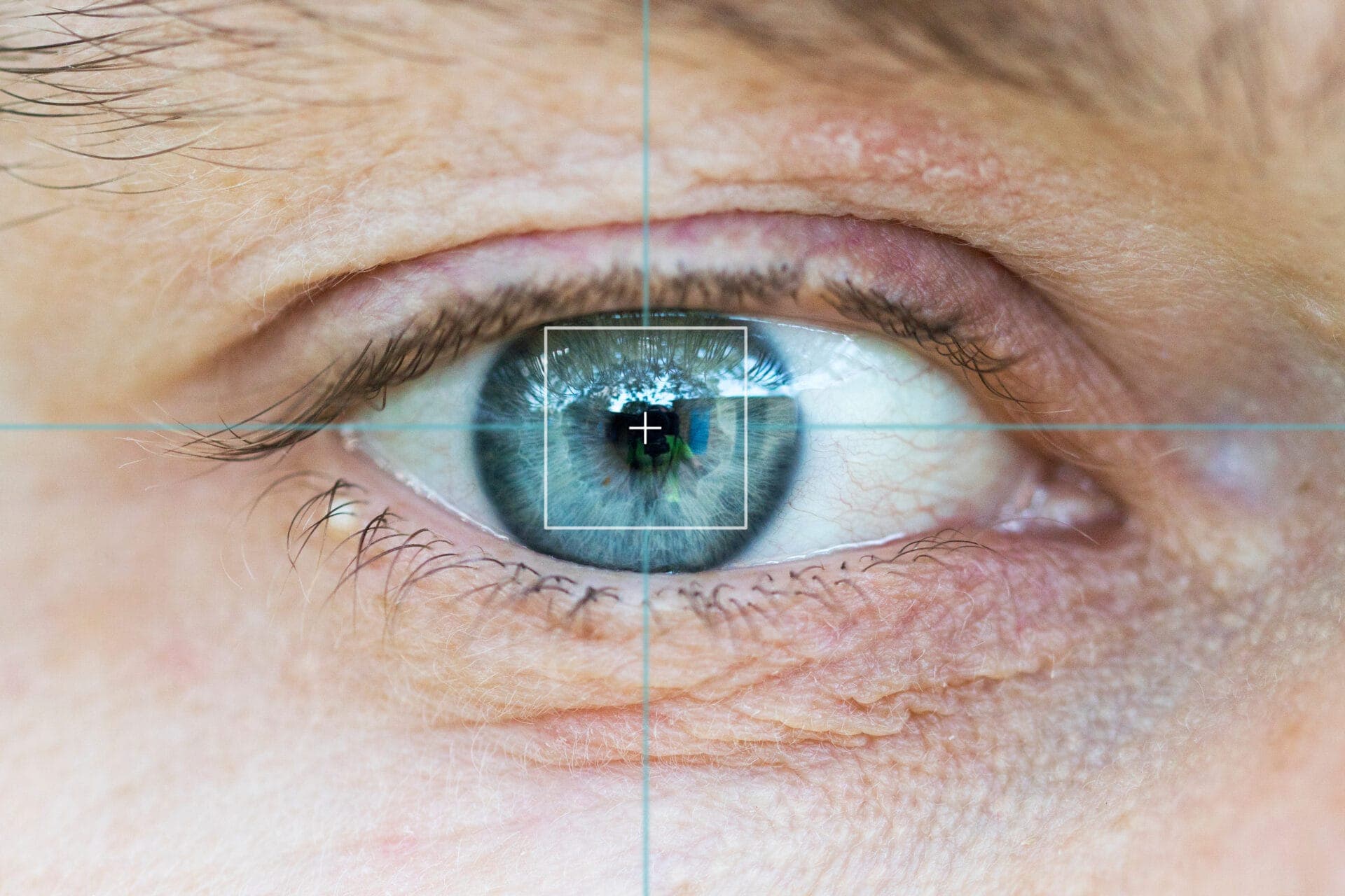 Close-up of a human eye with an eye-tracking overlay, demonstrating precision gaze detection technology.