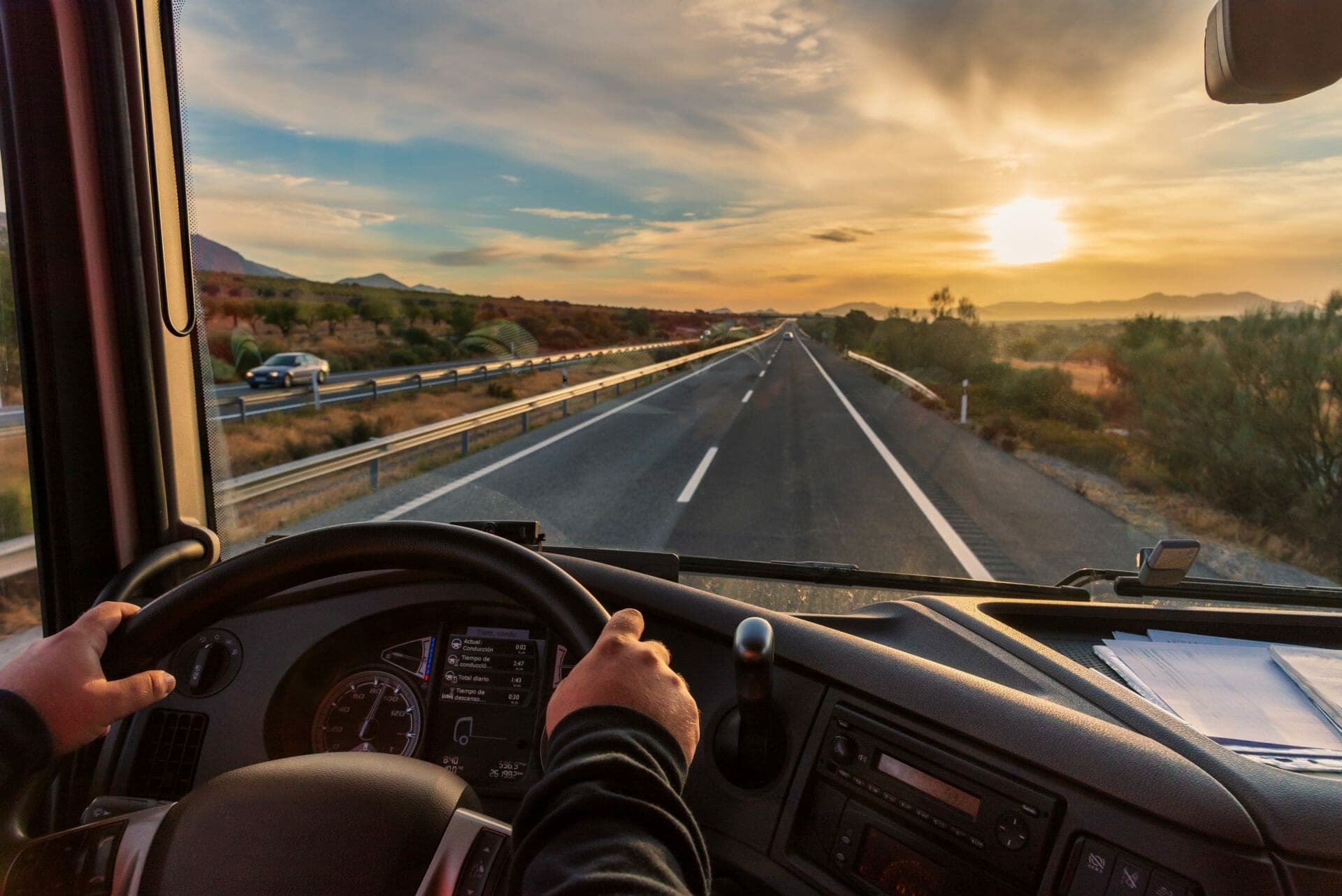 View from the cabin of a fleet vehicle at sunset