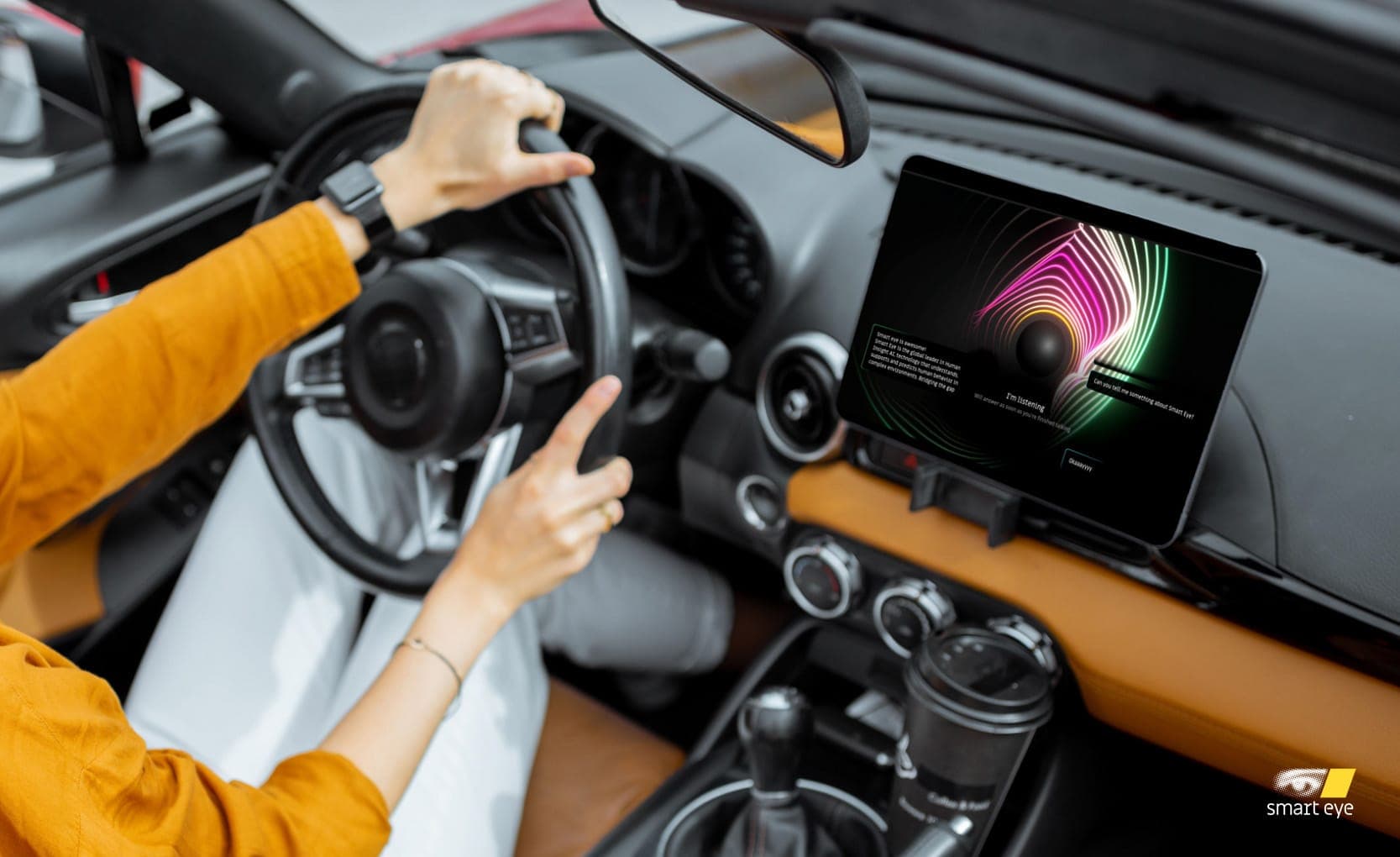 A car interior integrated with Sheila, Smart Eye's AI Co-Driver based on Generative AI