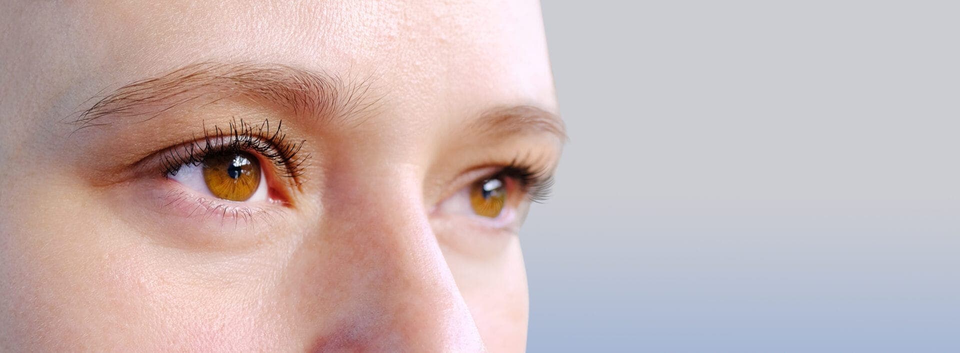 Close-up of a person's eyes looking into the distance, showcasing natural gaze and attention analysis.